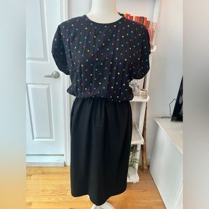 Black polka dot wiggle dress